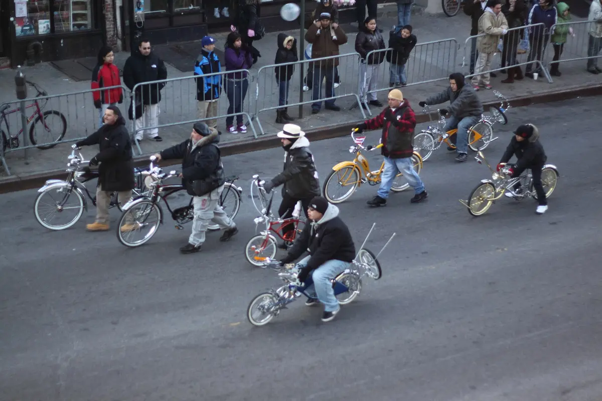 Riders on decorated lowrider bicycles in the Three Kings Day parade in Williamsburg, Brooklyn