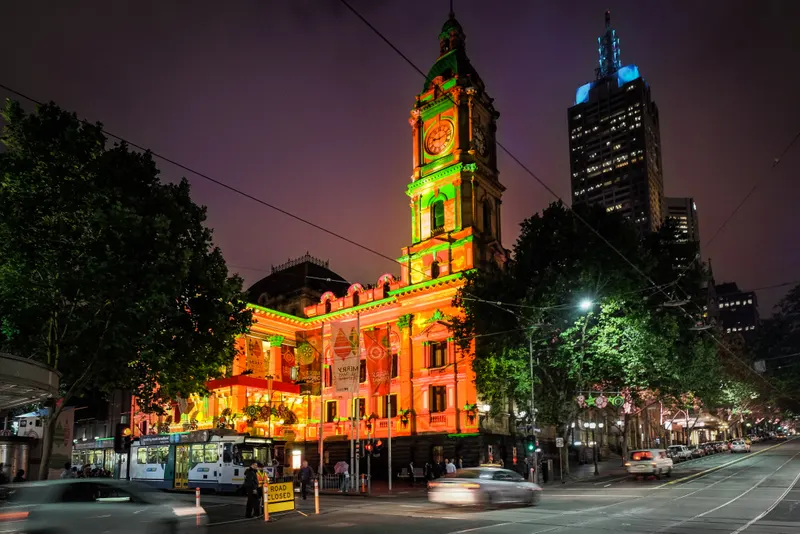 Melbourne Town Hall clock tower lit by a Christmas projection, December 2014