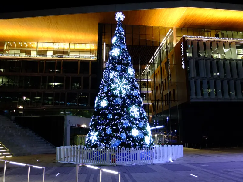 Christmas tree with snowflake ornaments in front of Surrey City Hall