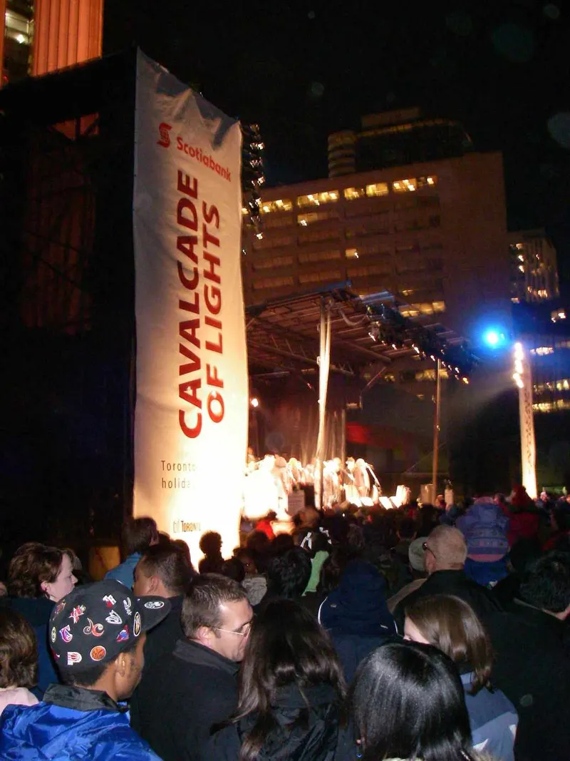 Cavalcade of Lights banner and stage in front of a crowd in Toronto