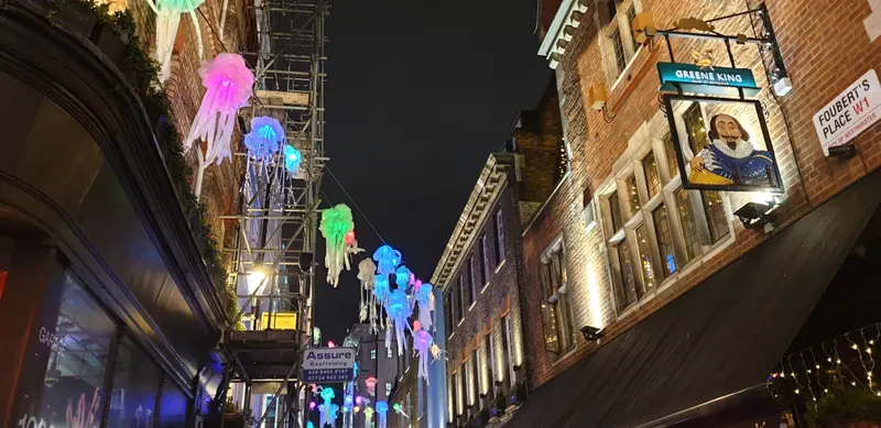 Glowing jellyfish lights above Carnaby Street