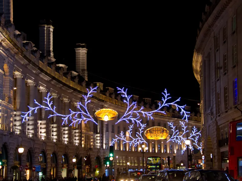 Illuminated branches along the curve of Regent Street at Christmas