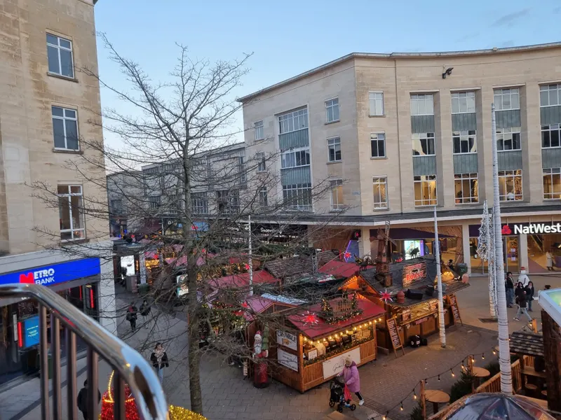 Aerial view of the Bristol Christmas Market stalls at dusk