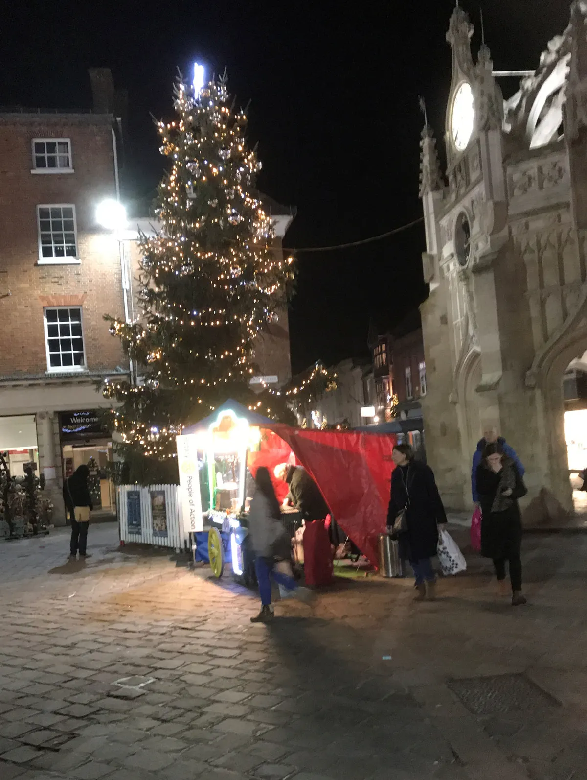 Christmas tree and a stall in Chichester city centre