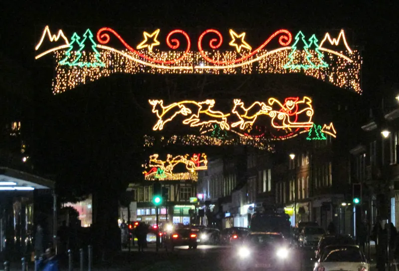 Christmas light displays above Guildford High Street at night