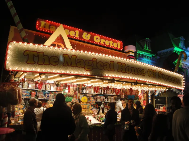 Brightly lit Hansel and Gretel stall at Hyde Park Winter Wonderland