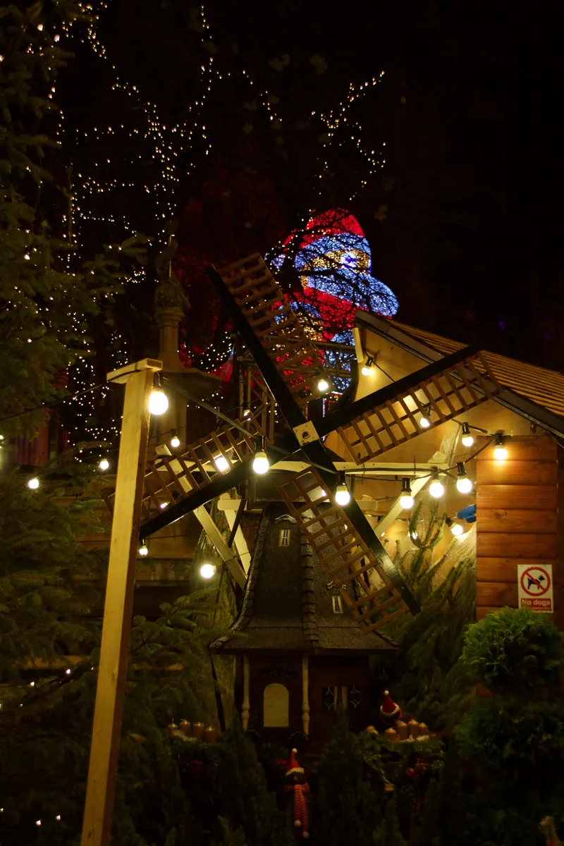 Lit-up windmill decoration on a chalet at the Manchester Christmas Markets