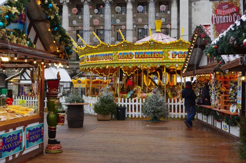 Carousel and wooden stalls at Nottingham Winter Wonderland