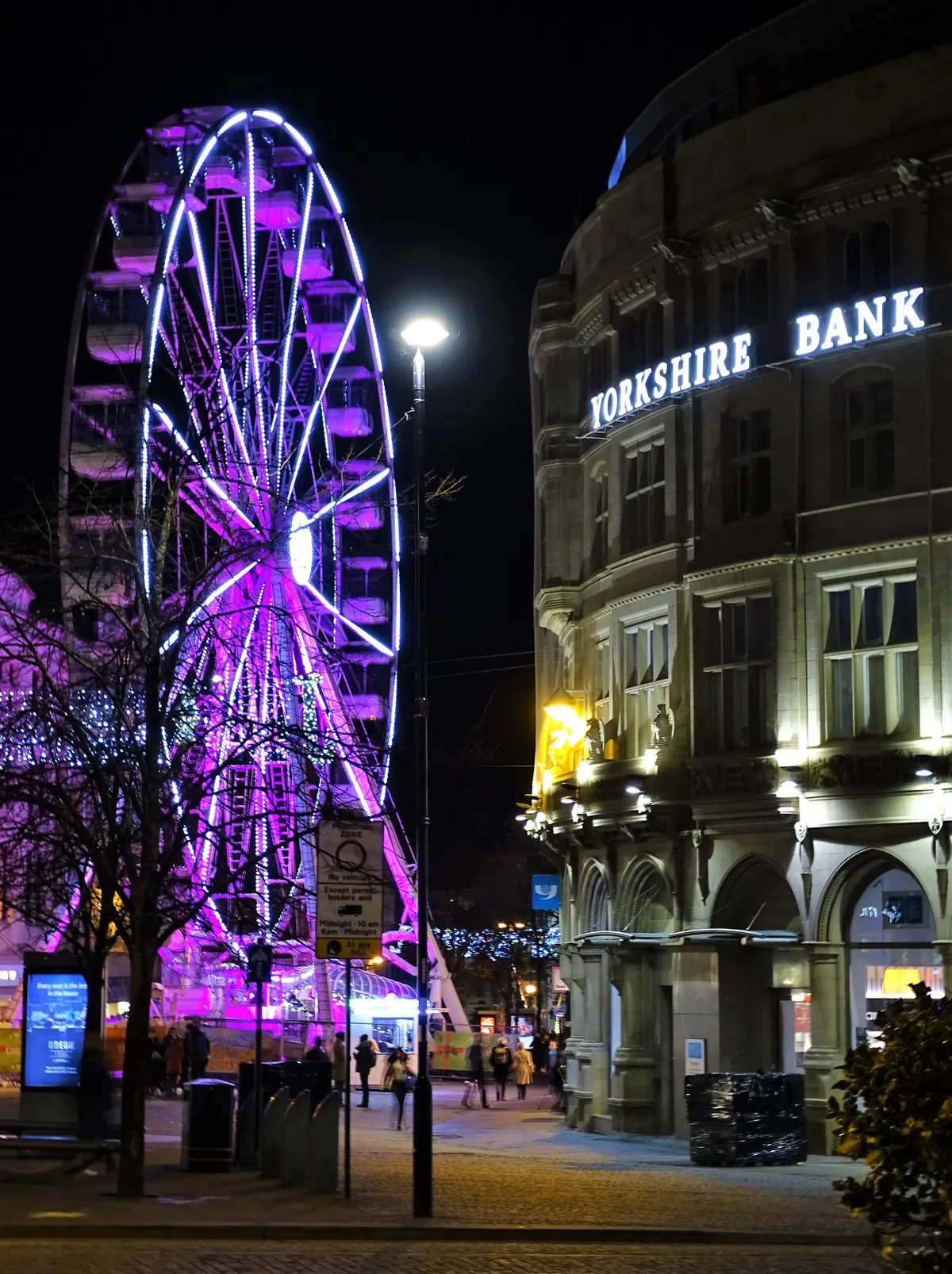 Sheffield Christmas wheel lit up at night on Fargate