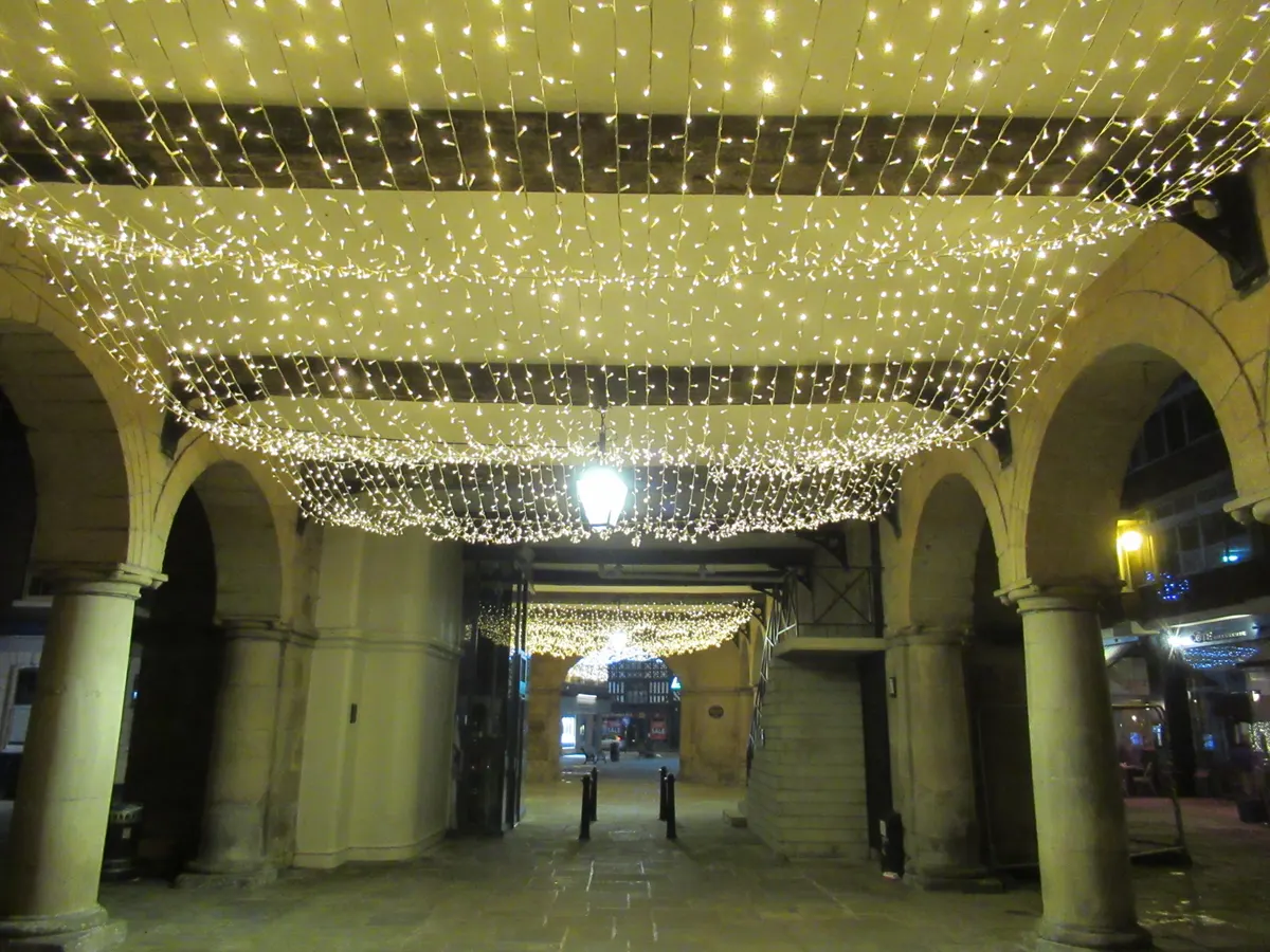 Canopy of white Christmas lights in Shrewsbury town centre
