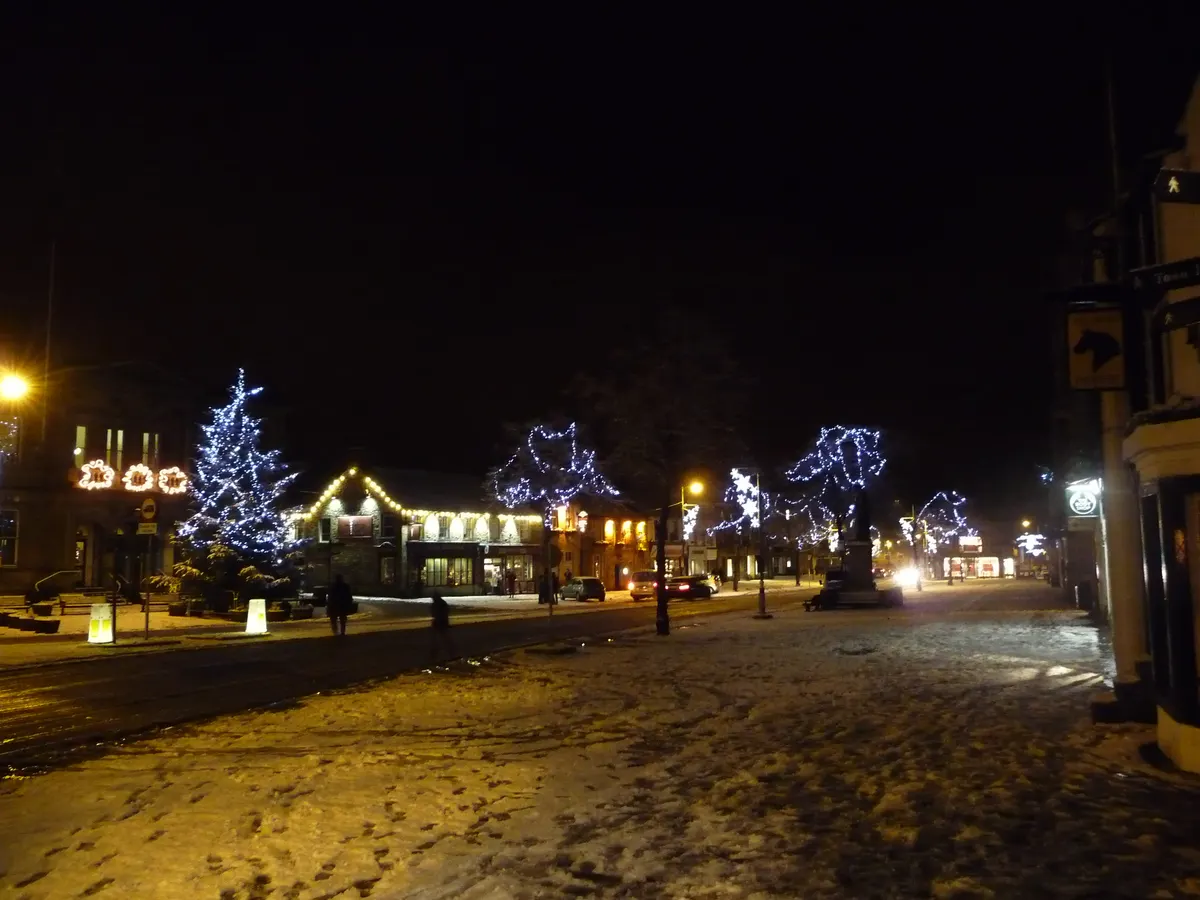 Christmas lights along Skipton High Street at night