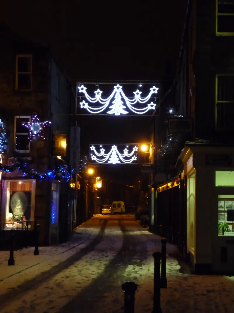 Christmas light displays over a Skipton street
