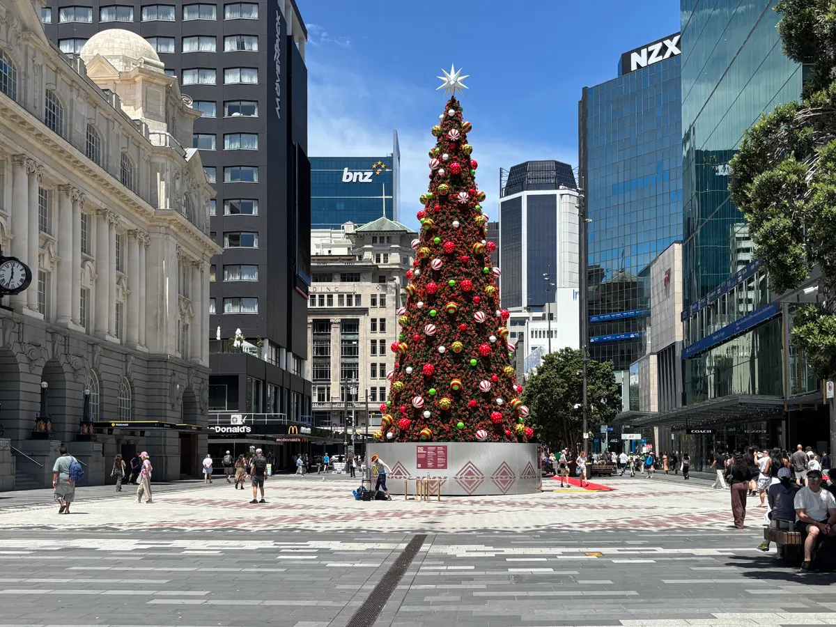 Giant decorated Christmas tree in Te Komititanga square, Britomart, Auckland, on a sunny summer day